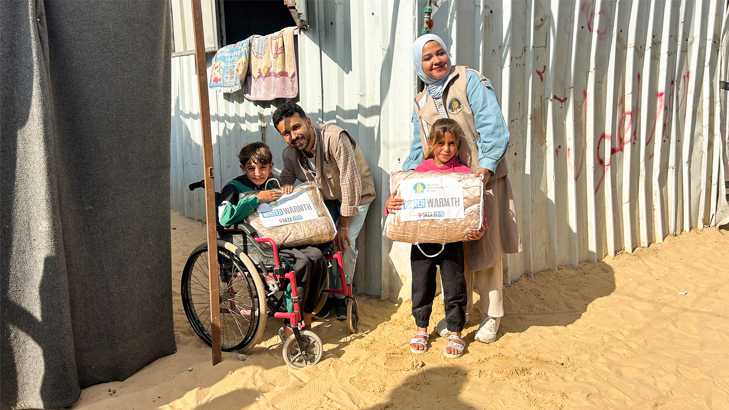 Winter coats handed to children
